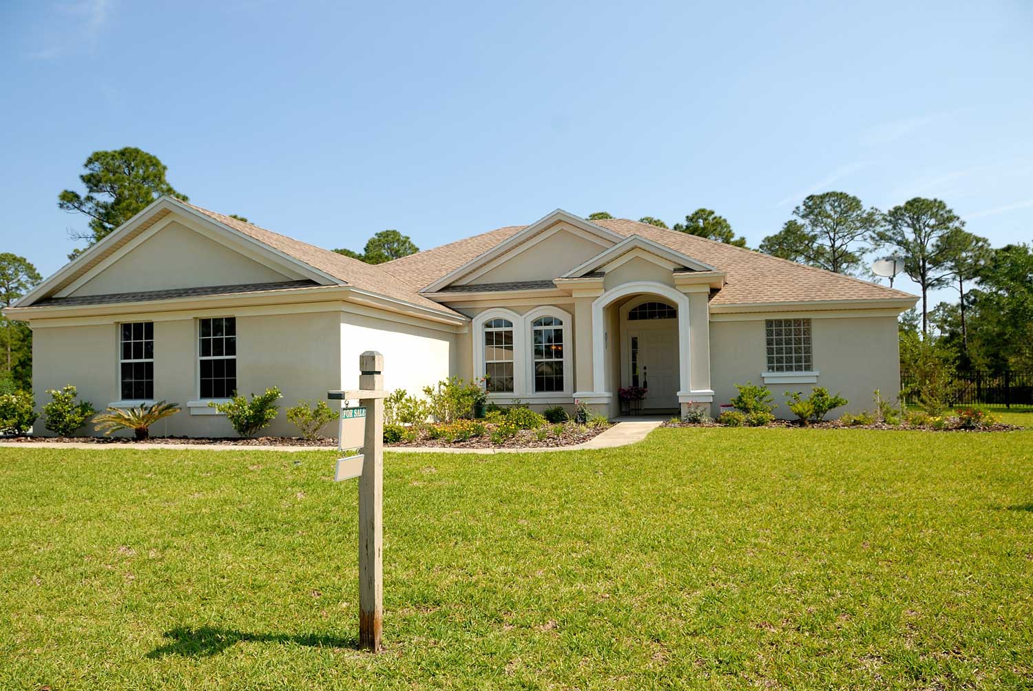 Suburban house with a green lawn